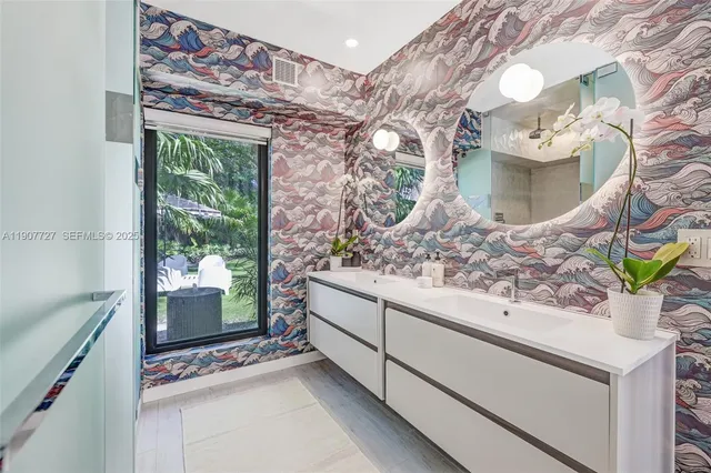 a bathroom with a sink a toilet and bathtub