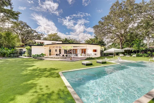 a view of swimming pool with garden