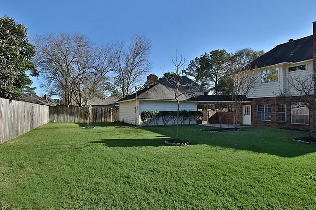 a house view with a garden space