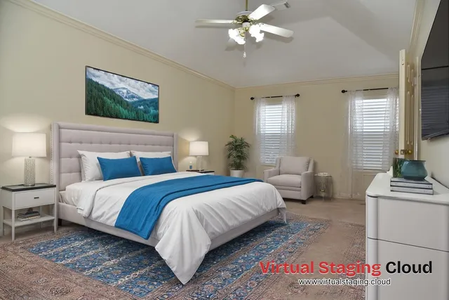 a bedroom with bed couches and a flat tv screen