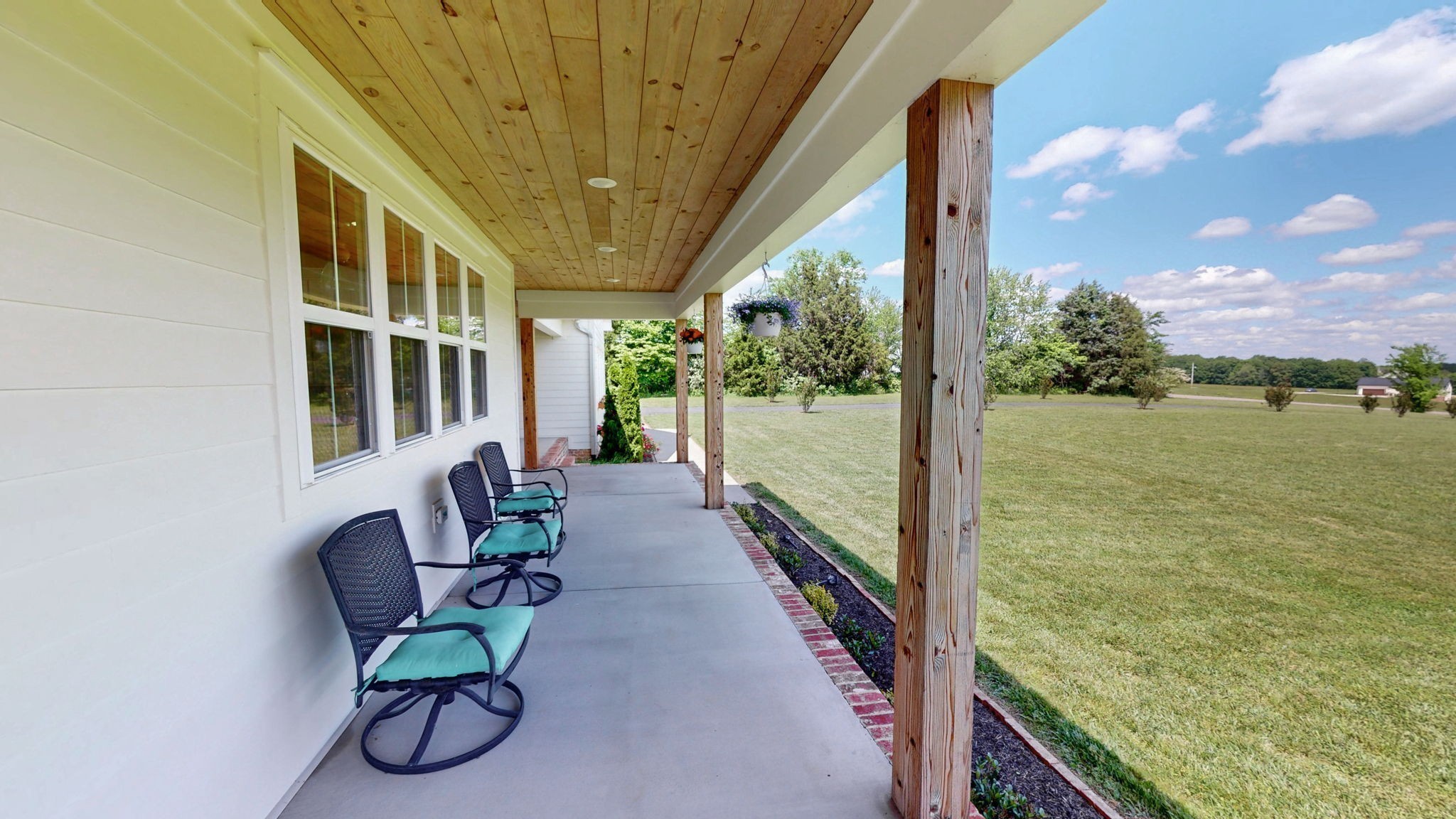 548 Buddy Road Burns, TN 37029 - Photo 2 of 47 a view of two chairs in the balcony
