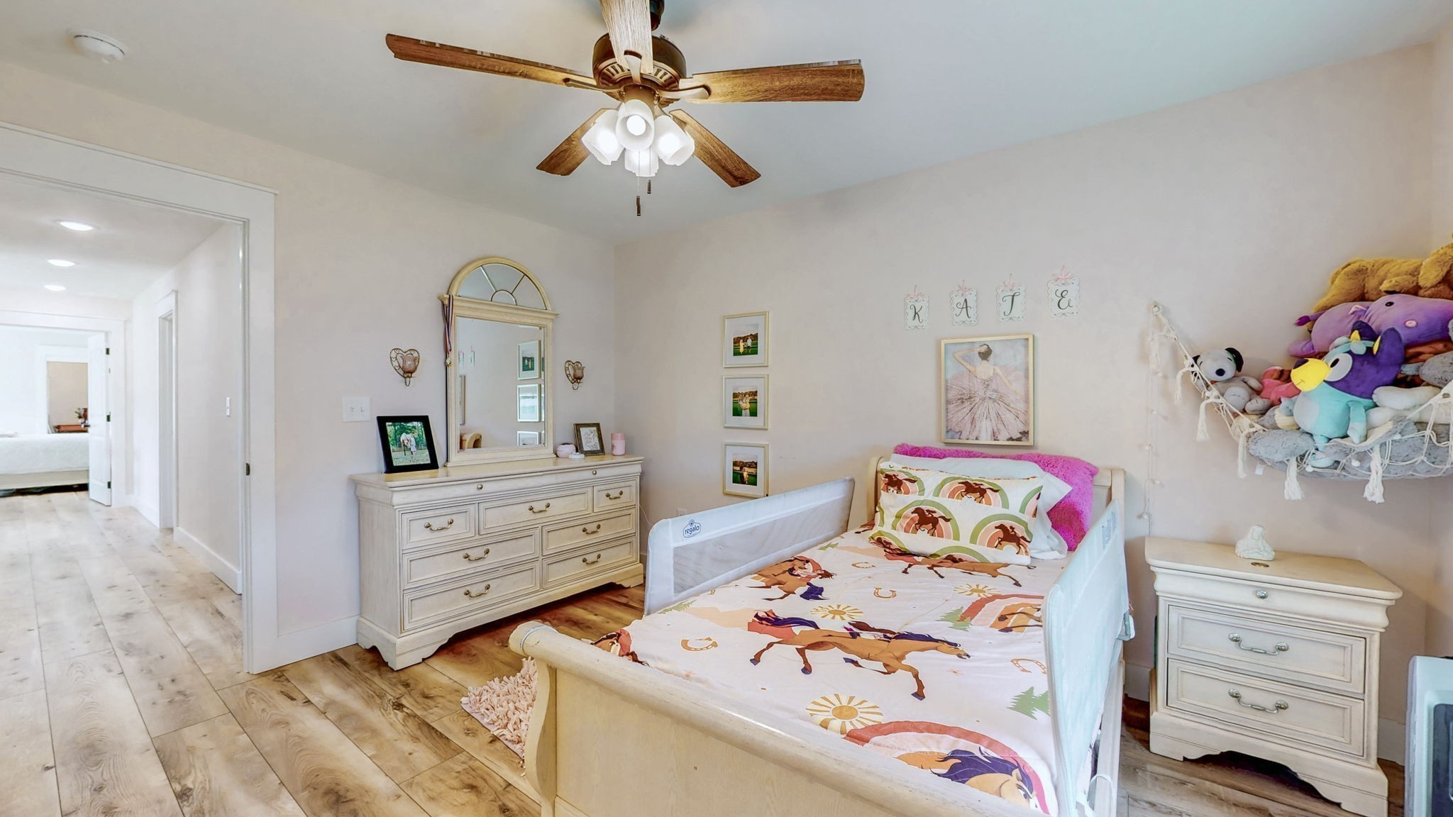 548 Buddy Road Burns, TN 37029 - Photo 24 of 47 a bedroom with a bed and a dresser in it