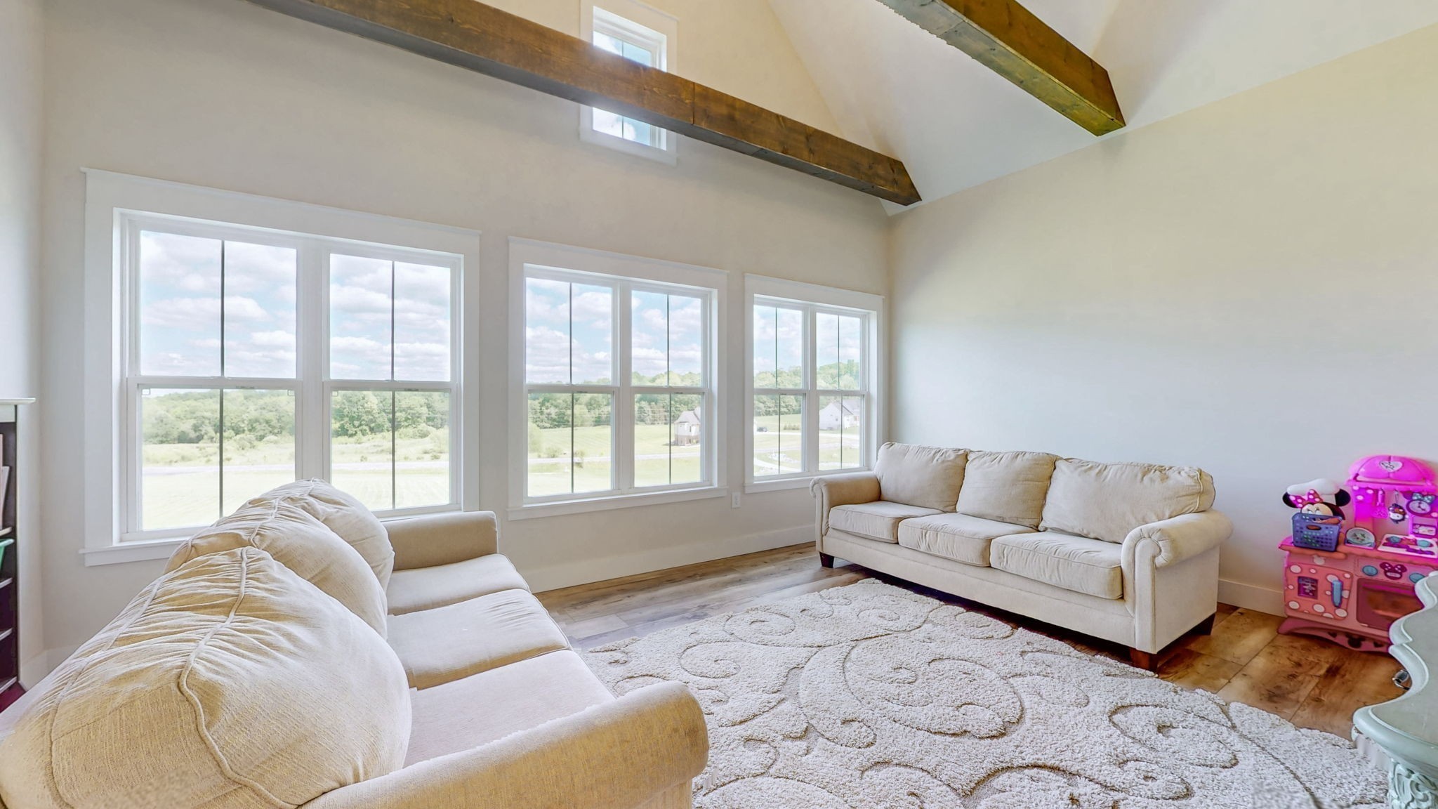 548 Buddy Road Burns, TN 37029 - Photo 28 of 47 a living room with furniture and a large window
