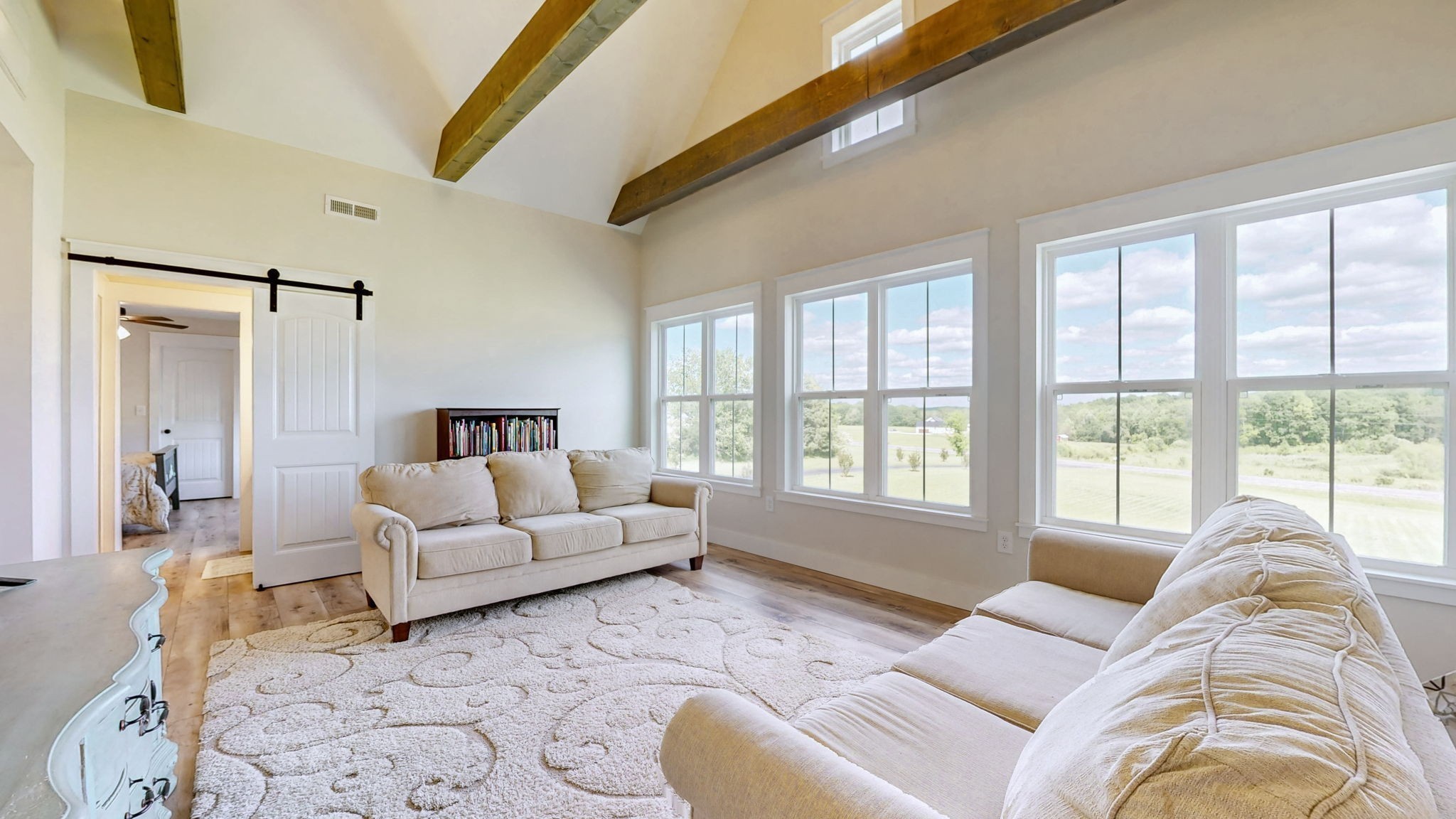 548 Buddy Road Burns, TN 37029 - Photo 29 of 47 a living room with furniture and a large window