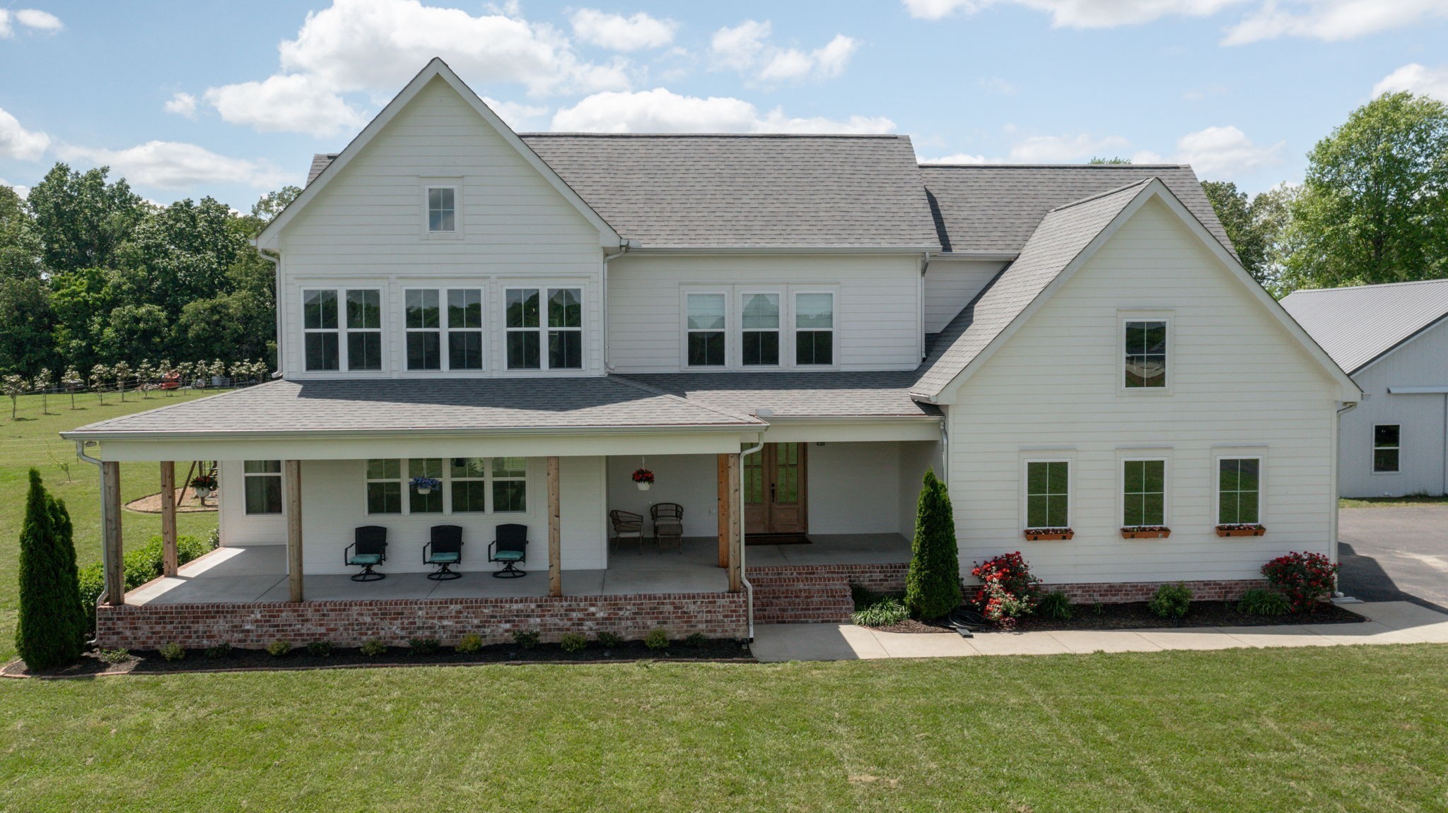 548 Buddy Road Burns, TN 37029 - Photo 33 of 47 a front view of a house with a yard