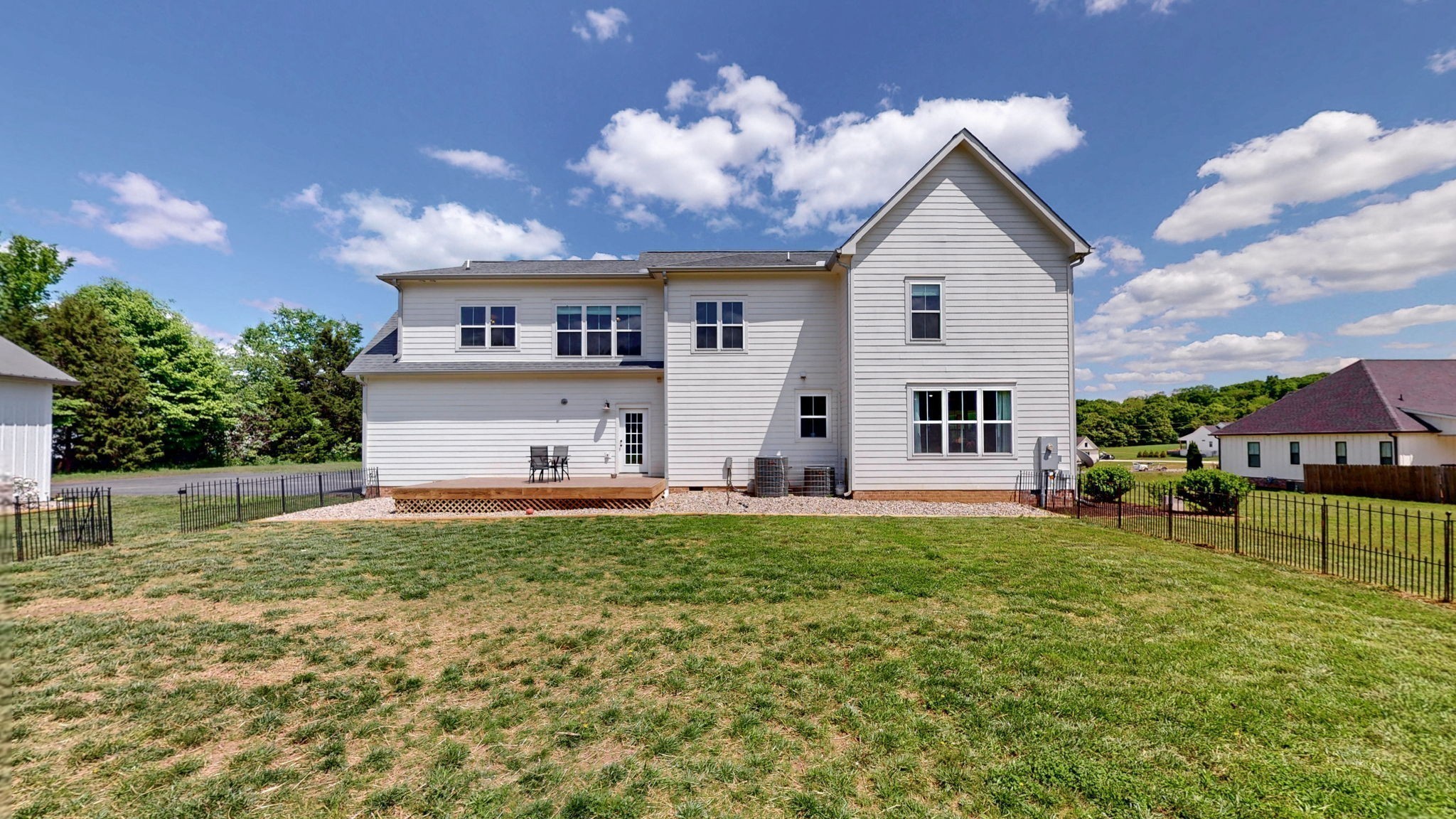 548 Buddy Road Burns, TN 37029 - Photo 41 of 47 a view of a house with a yard and a patio