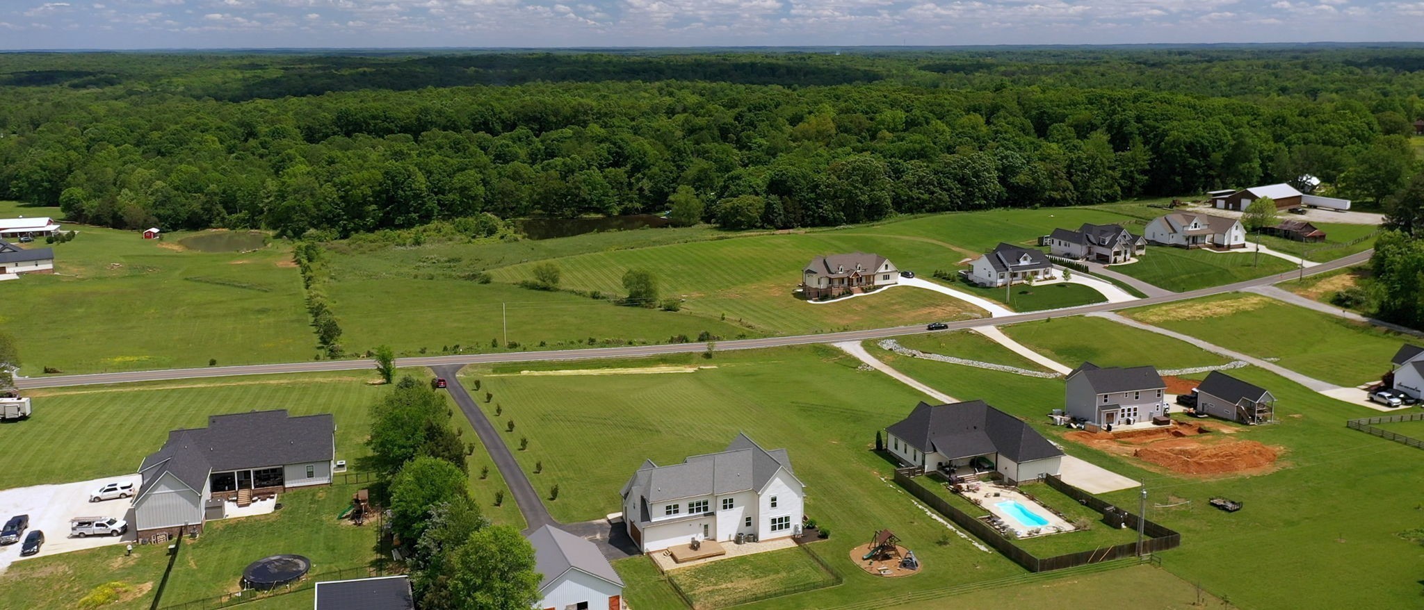 548 Buddy Road Burns, TN 37029 - Photo 43 of 47 an aerial view of a golf course with parking space
