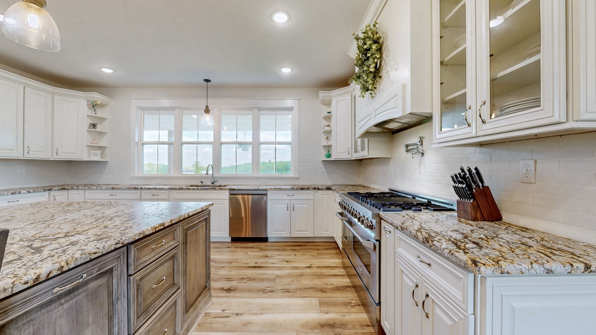548 Buddy Road Burns, TN 37029 - Photo 6 of 47 a kitchen with a stove and a sink