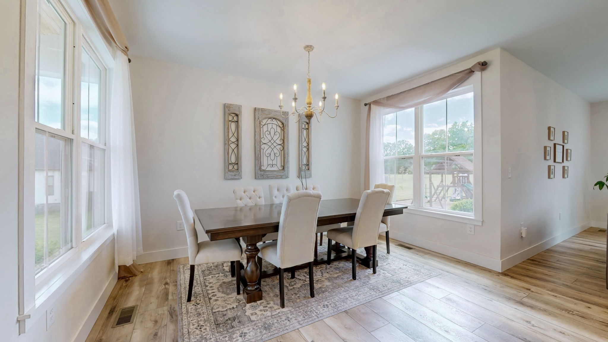 548 Buddy Road Burns, TN 37029 - Photo 10 of 47 a view of a dining room with furniture window and wooden floor
