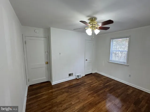 a view of an empty room with window
