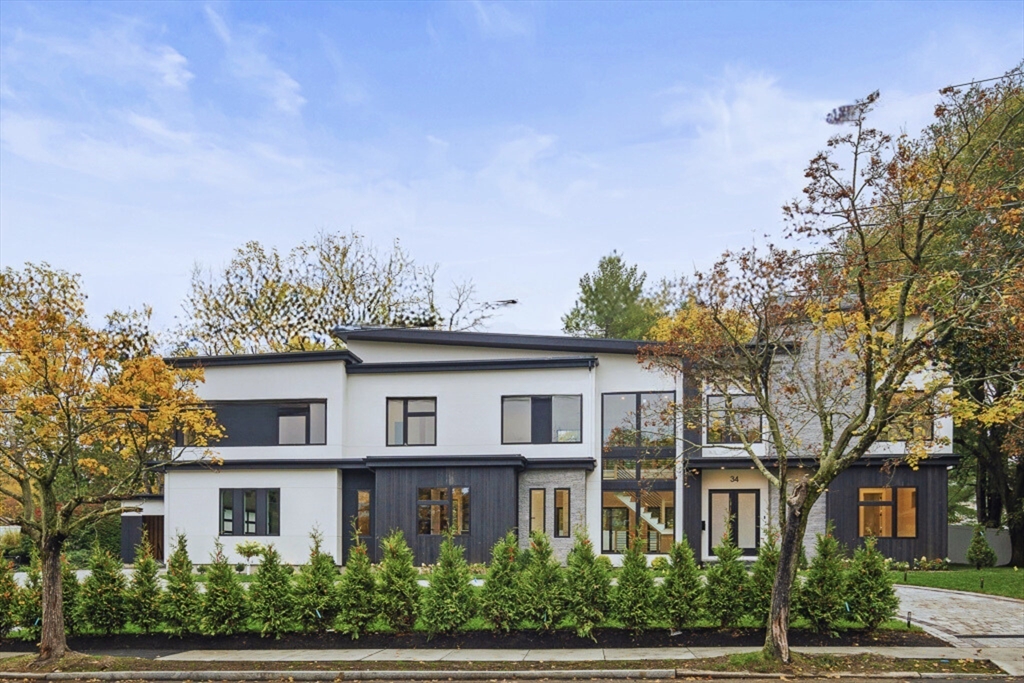 34 Rachel Road Newton, MA 02459 - Photo 2 of 9 a front view of a residential houses with yard and green space