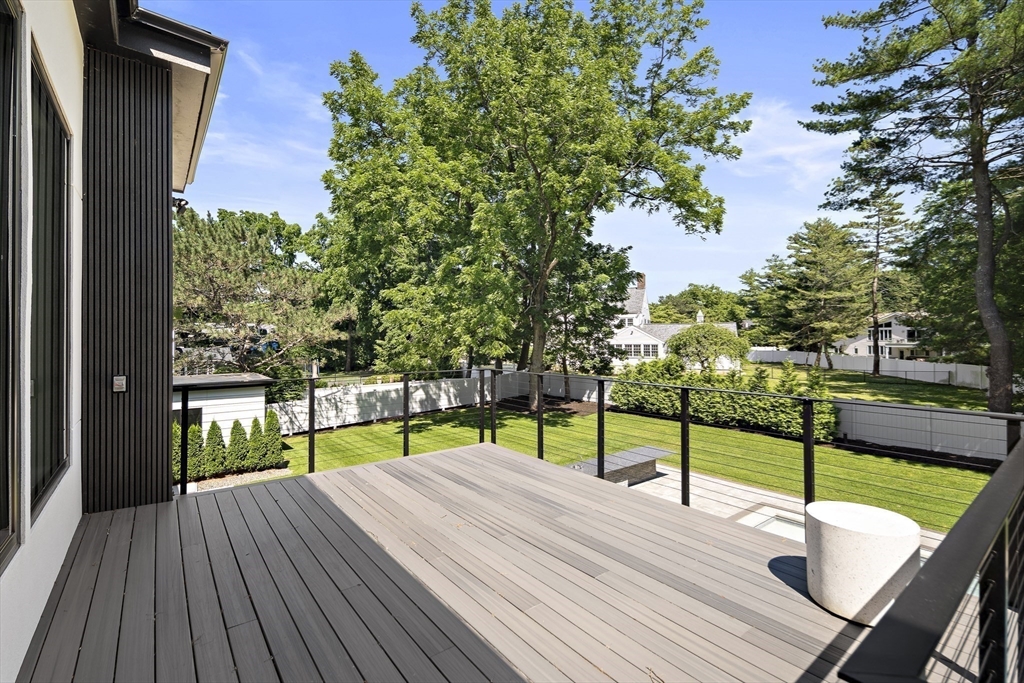 34 Rachel Road Newton, MA 02459 - Photo 9 of 9 a view of a deck with chair and wooden floor