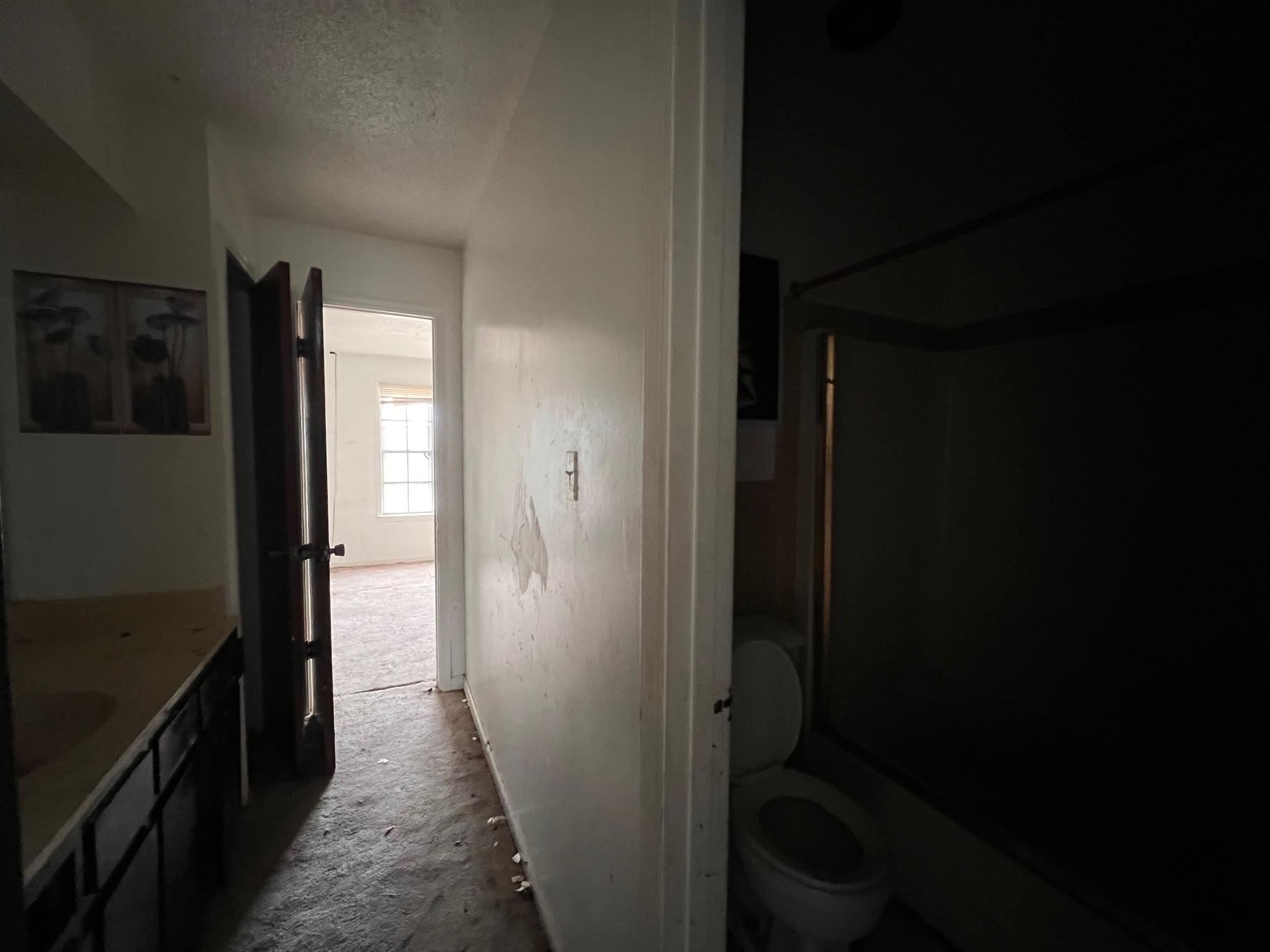 4783 Winchester Road Memphis, TN 38118 - Photo 12 of 14 Bathroom featuring vanity, shower / bath combination, and a textured ceiling