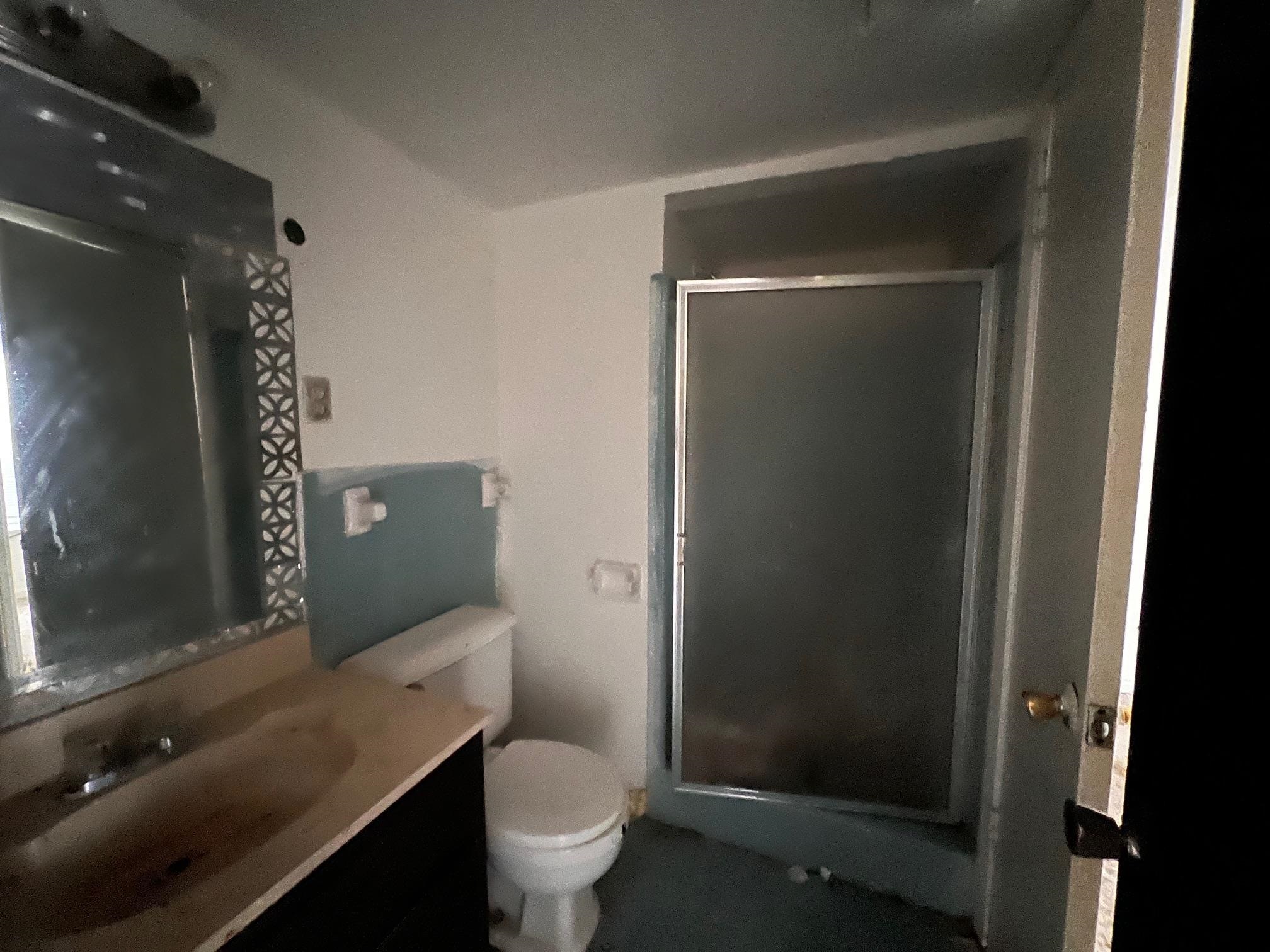 4783 Winchester Road Memphis, TN 38118 - Photo 6 of 14 Full bathroom with vanity and a shower stall