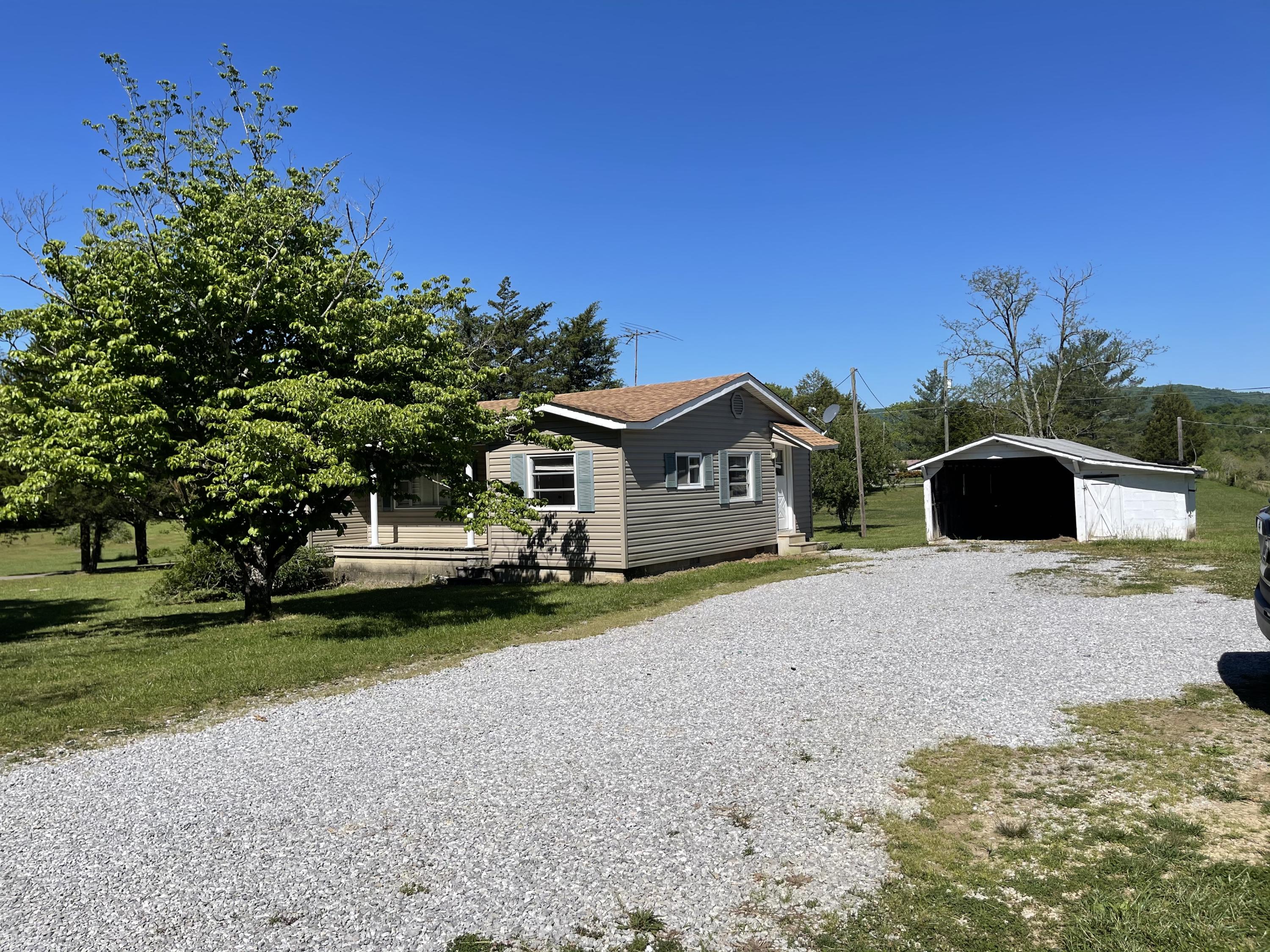 13807 Upper East Valley Road Pikeville, TN 37367 - Photo 2 of 12 7D4442A5-F2DD-4A33-A18C-7734D92D3761
