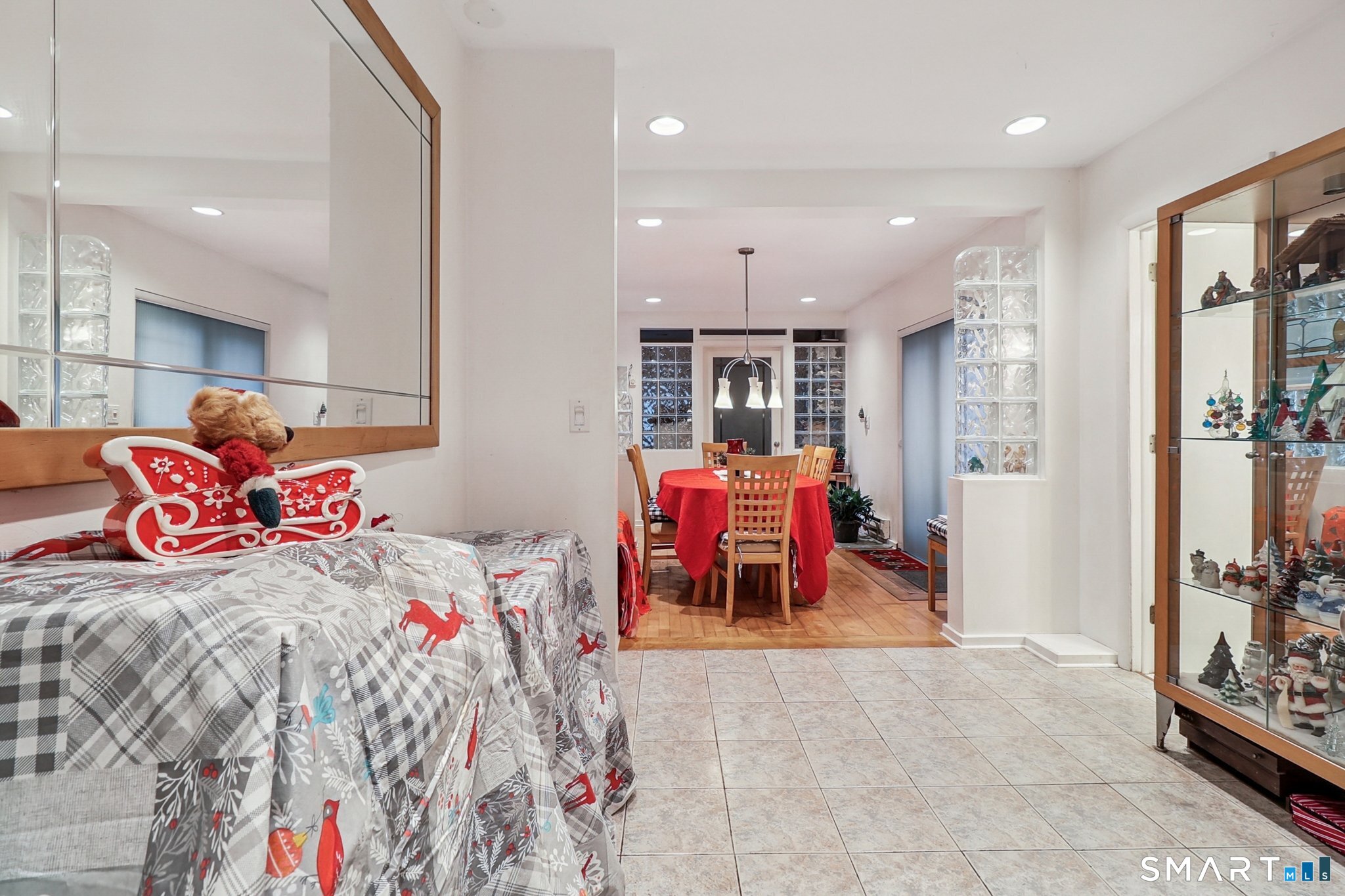 36 Spinning Wheel Road Monroe, CT 06468 - Photo 13 of 25 a living room with furniture and a flat screen tv