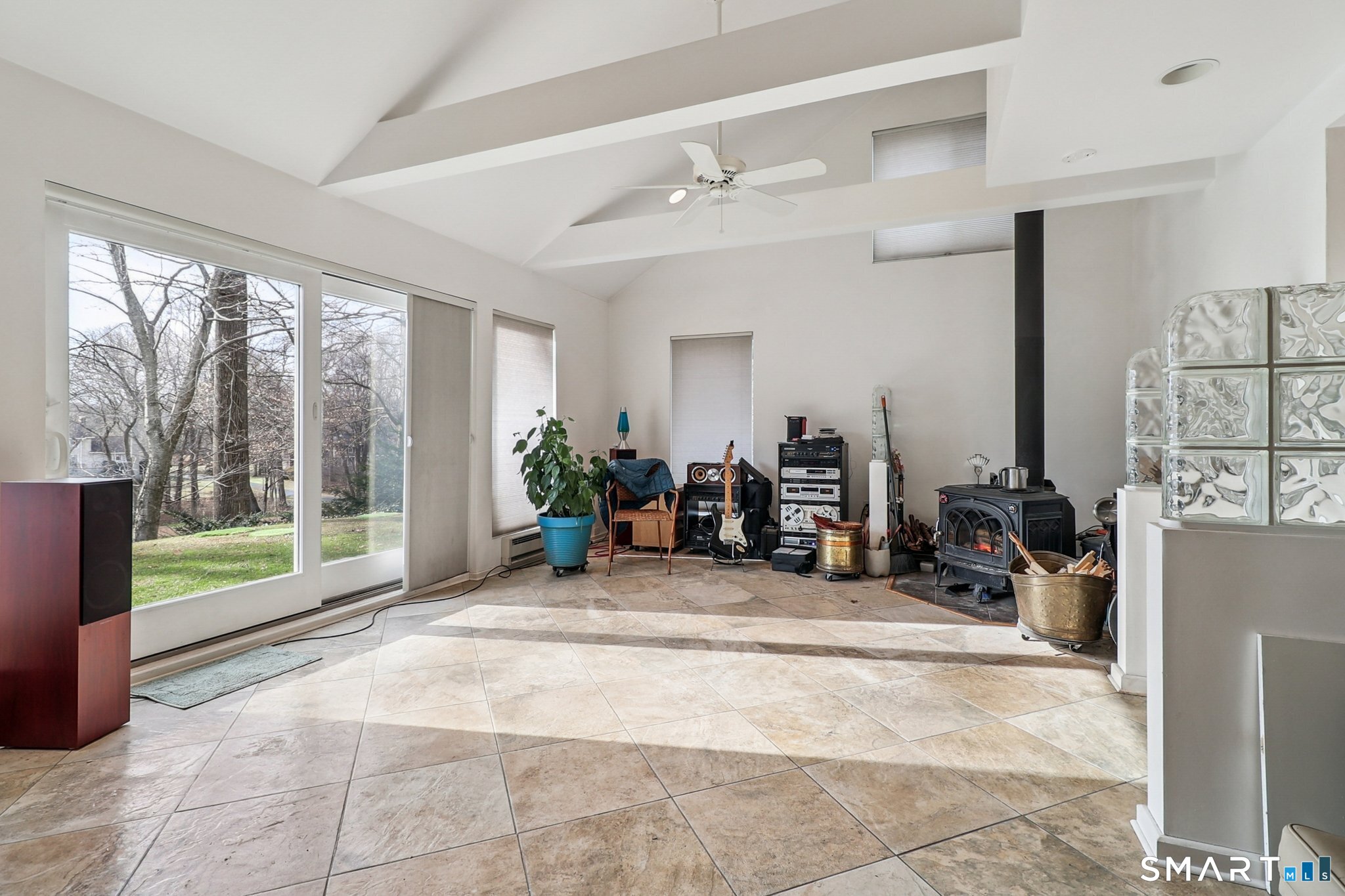 36 Spinning Wheel Road Monroe, CT 06468 - Photo 5 of 25 a view of a room with gym equipment and floor to ceiling window
