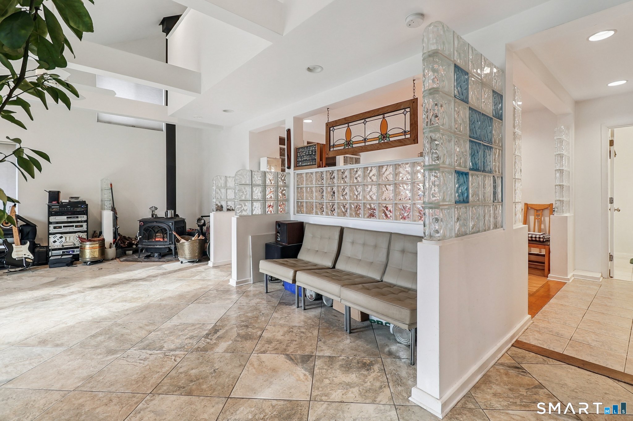 36 Spinning Wheel Road Monroe, CT 06468 - Photo 9 of 25 a living room with furniture a large mirror and a fireplace