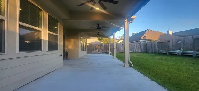 a garden with wooden fence