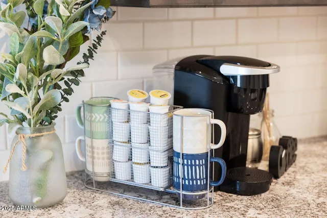 a bathroom with a toilet and a mirror