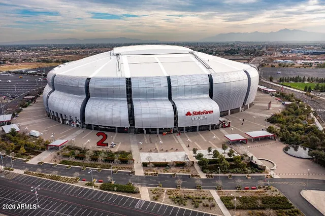 a front view of a house with sitting space