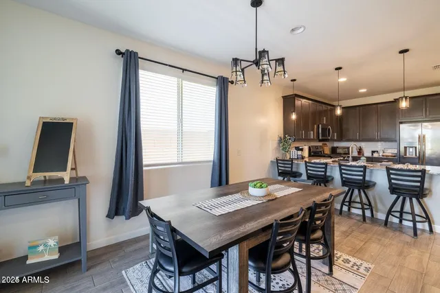 a view of a dining room with furniture