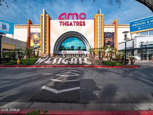 a view of a house with backyard and porch