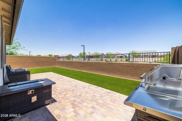 a utility room with a refrigerator a washer and dryer
