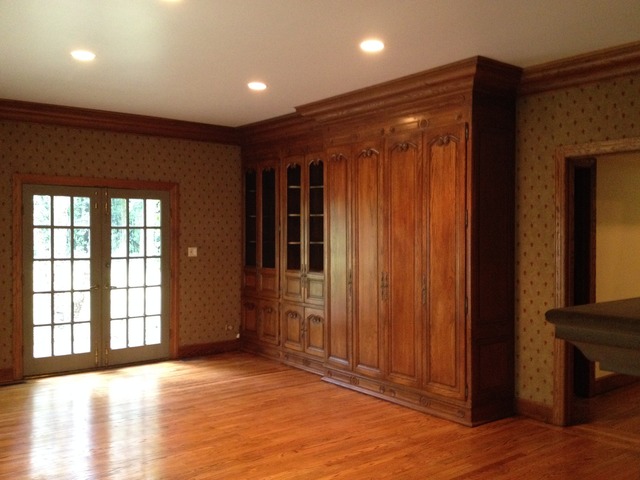 149 Algonquin Road Zion, IL 60099 - Photo 7 of 25 a view of an empty room with wooden floor and a window