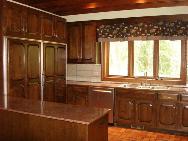 149 Algonquin Road Zion, IL 60099 - Photo 9 of 25 a kitchen with a sink and large window