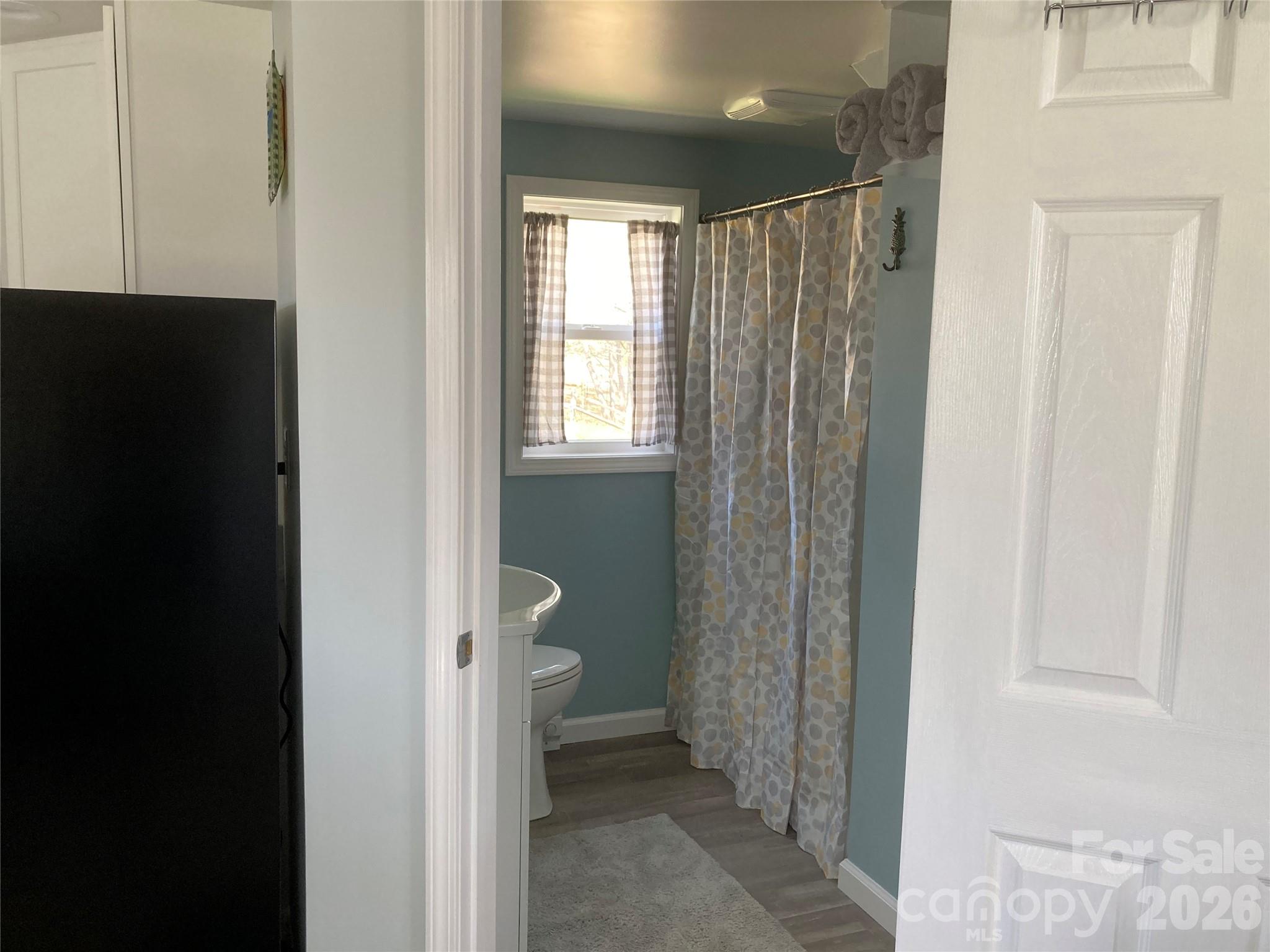 1434 Lake Adger Road Mill Spring, NC 28756 - Photo 30 of 47 a view of a bathroom with a toilet