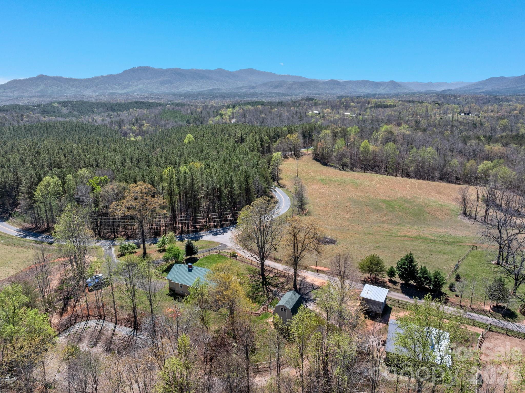 1434 Lake Adger Road Mill Spring, NC 28756 - Photo 43 of 47 a view of a lake in middle of the town