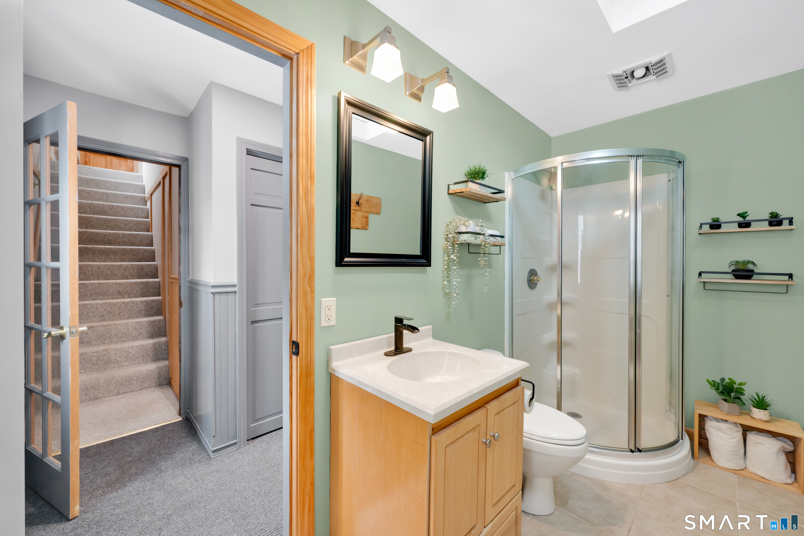 16 Higgins Way Tolland, CT 06084 - Photo 18 of 42 a bathroom with a toilet sink and shower
