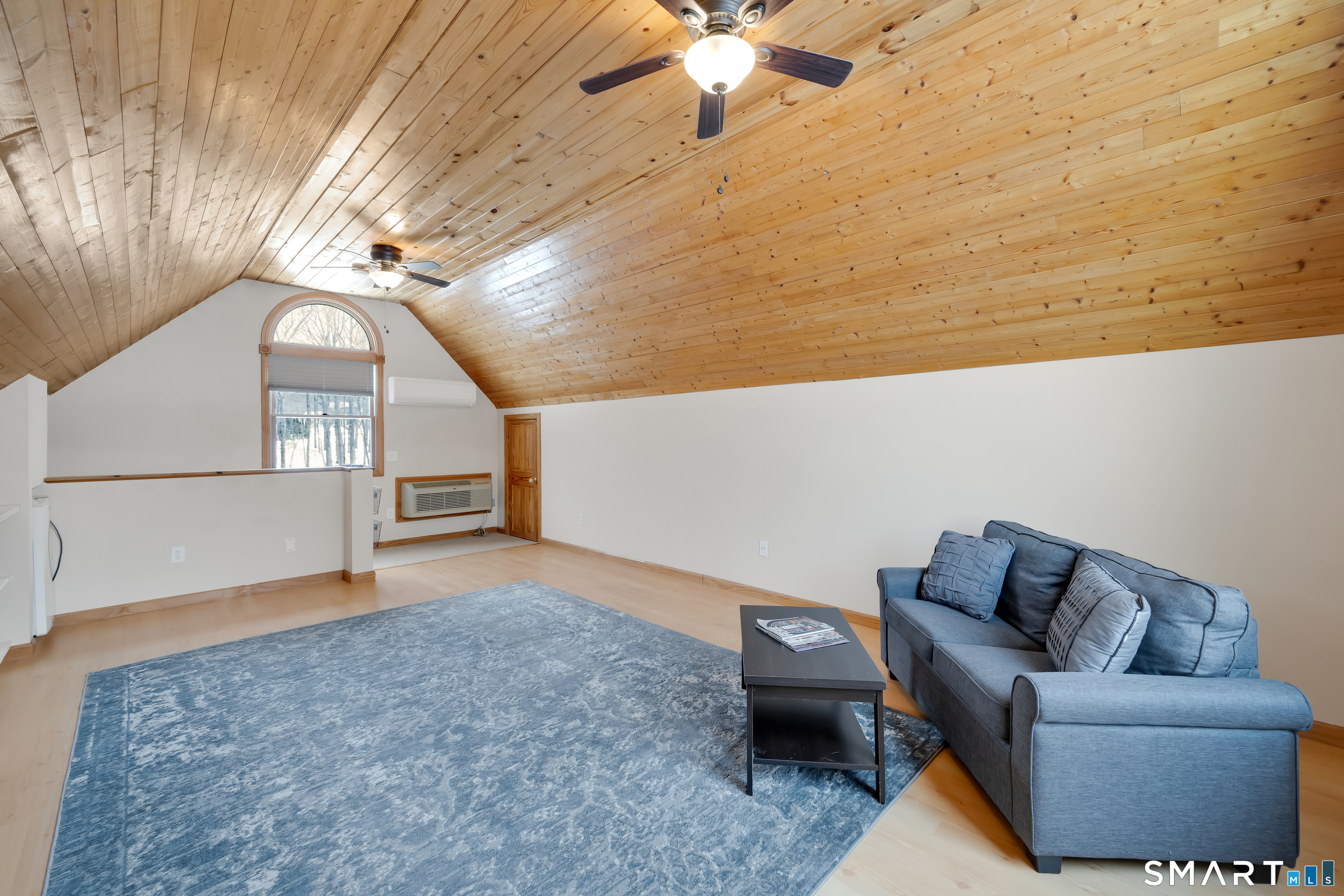 16 Higgins Way Tolland, CT 06084 - Photo 28 of 42 a living room with furniture and a ceiling fan