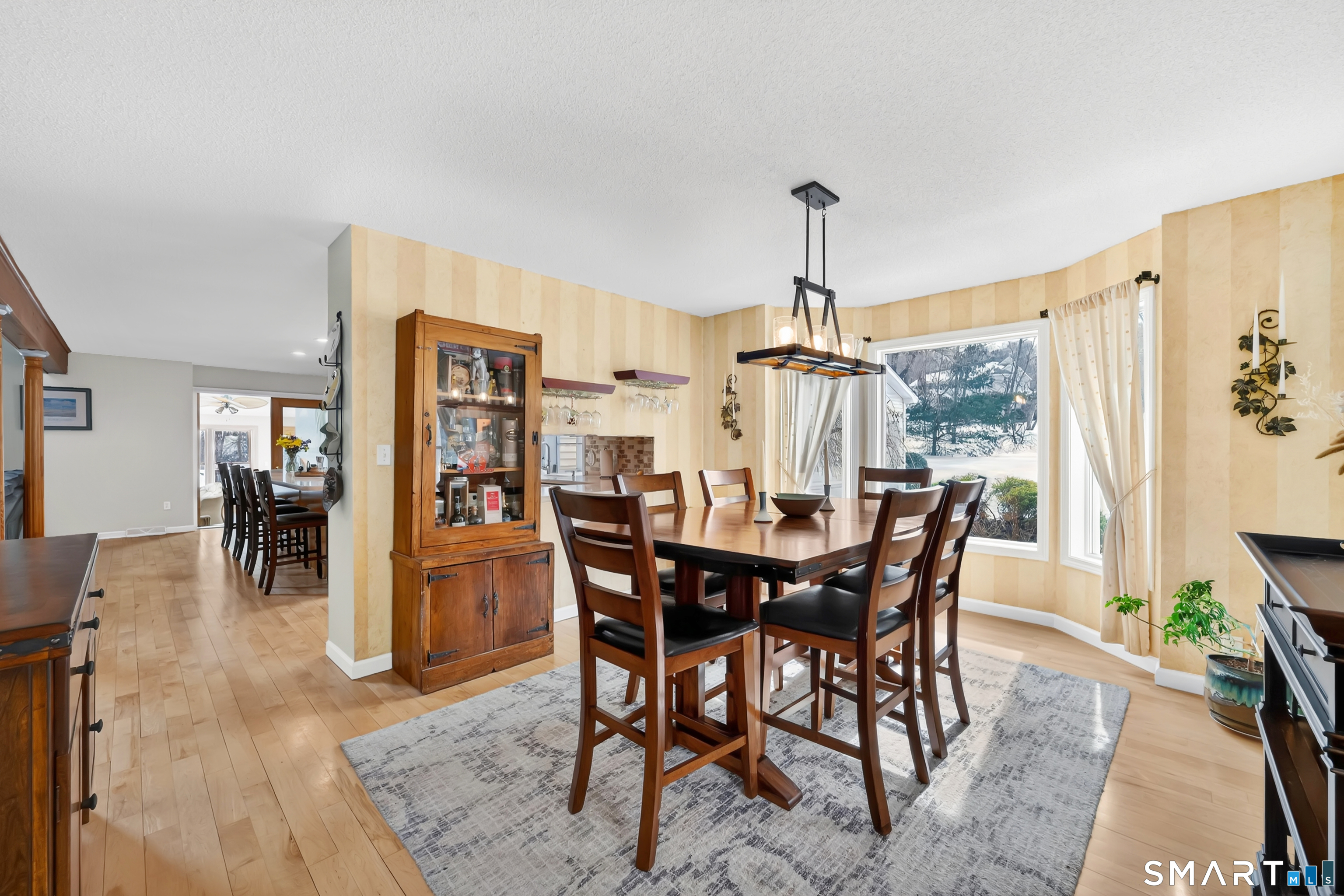 16 Higgins Way Tolland, CT 06084 - Photo 38 of 42 a view of a dining room with furniture and window