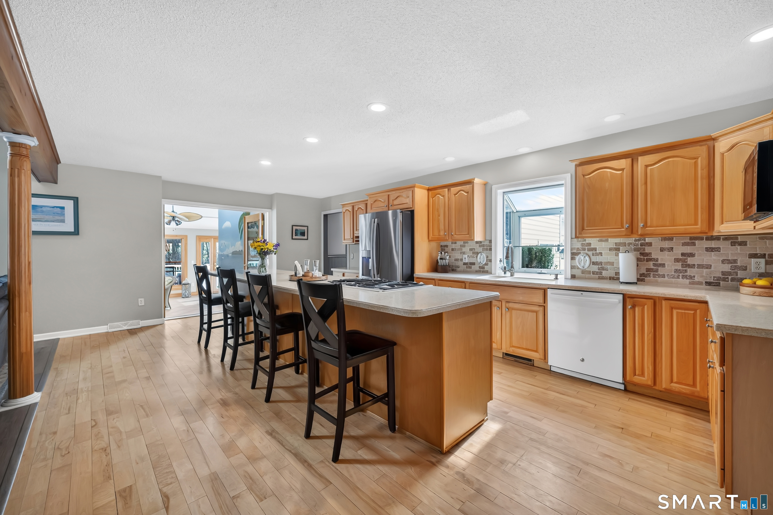 16 Higgins Way Tolland, CT 06084 - Photo 39 of 42 a kitchen with lots of wooden furniture appliances and cabinets