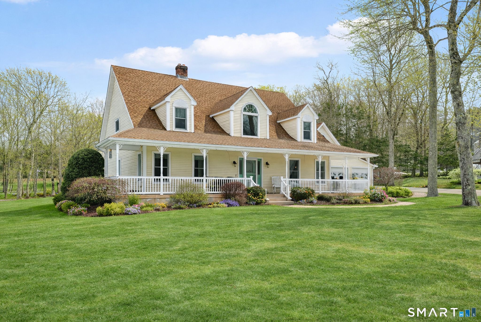 16 Higgins Way Tolland, CT 06084 - Photo 41 of 42 a front view of a house with a garden