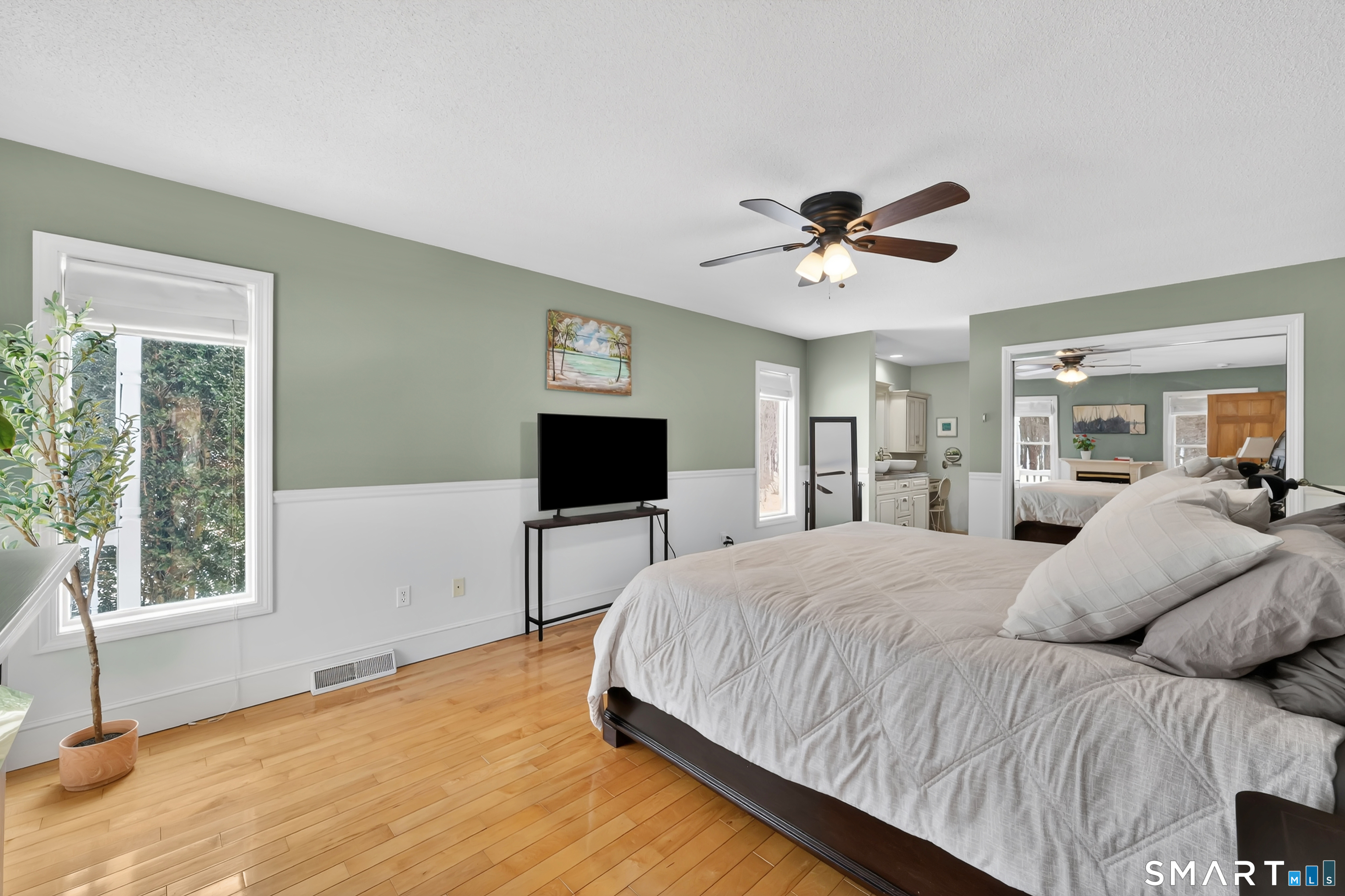 16 Higgins Way Tolland, CT 06084 - Photo 10 of 42 a bedroom with a bed and a flat screen tv