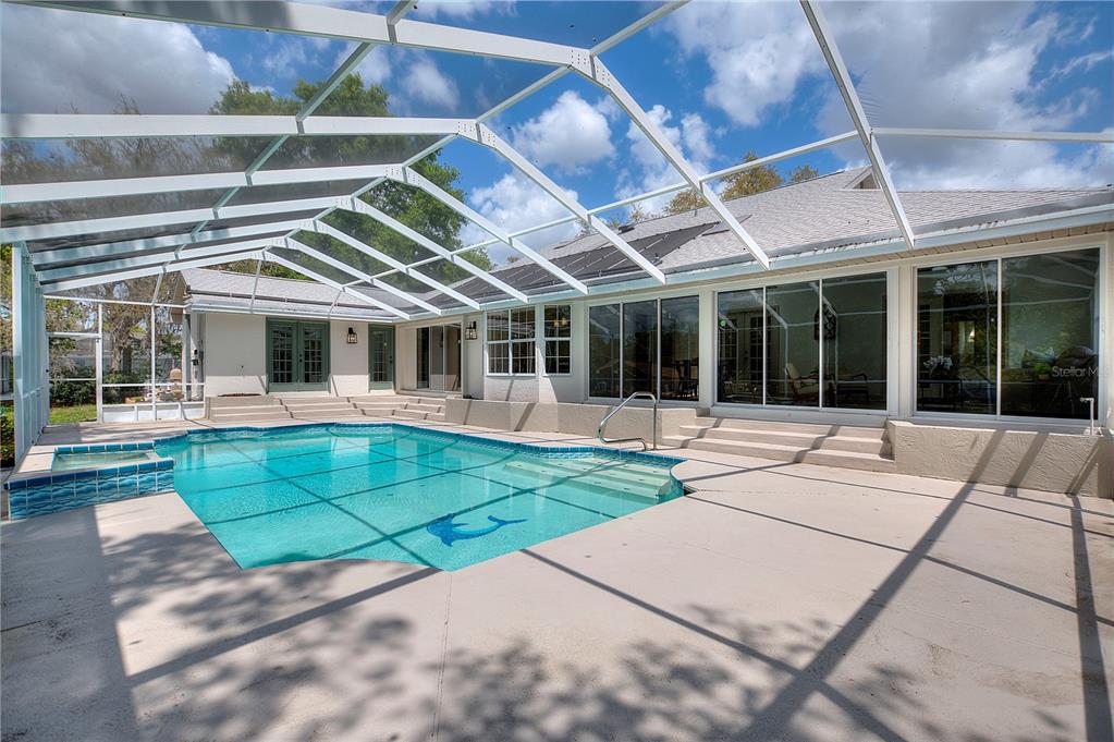 419 Silas Court Spring Hill, FL 34609 - Photo 52 of 56 a view of a house with a backyard and porch