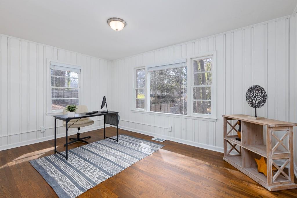 282 Willis Mill Road Southwest Atlanta, GA 30311 - Photo 11 of 25 a living room with furniture a window and a table