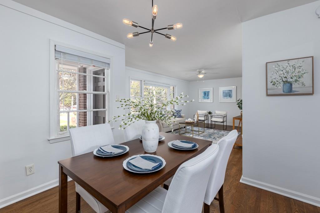 282 Willis Mill Road Southwest Atlanta, GA 30311 - Photo 8 of 25 a view of a dining room with furniture and wooden floor
