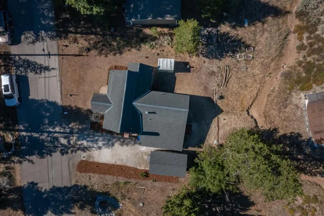 a view of a street with a mountain