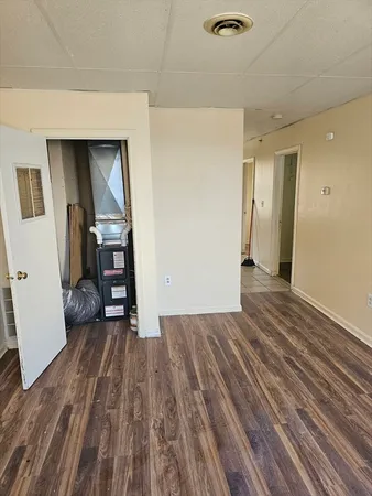 a view of a livingroom with wooden floor