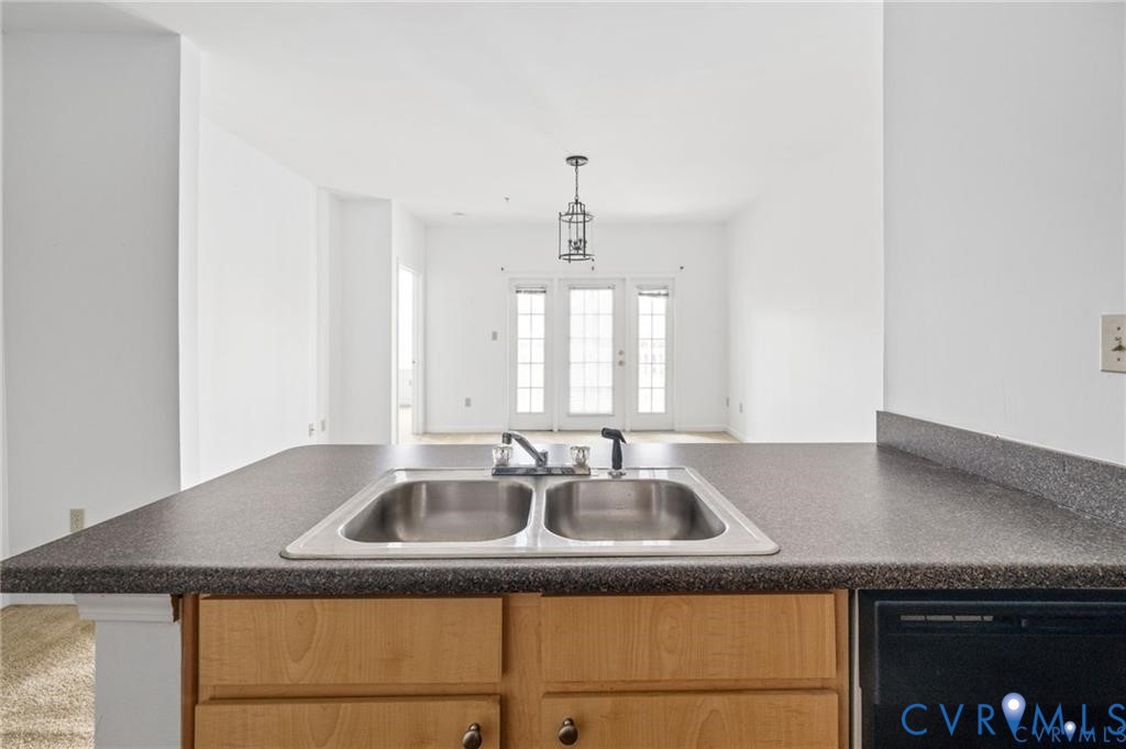 614 Bristol Village Drive, Unit 203 Midlothian, VA 23114 - Photo 11 of 32 a kitchen that has a sink and cabinets