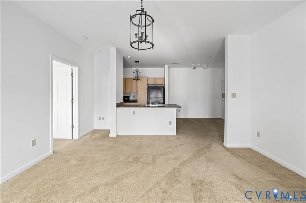 614 Bristol Village Drive, Unit 203 Midlothian, VA 23114 - Photo 12 of 32 a view of a kitchen with a sink and cabinet area