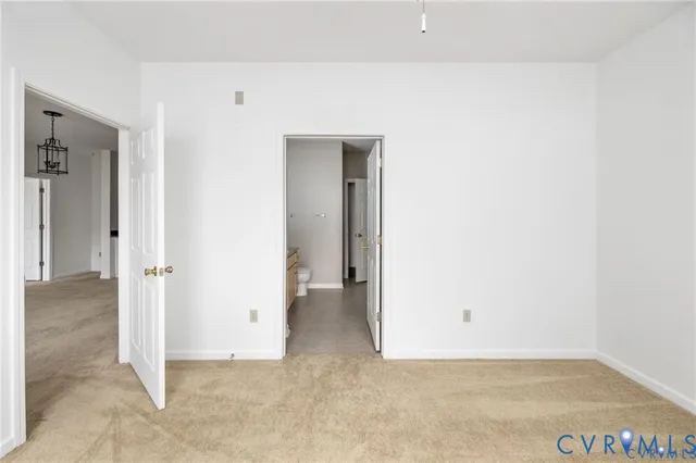 an empty room with a bathroom