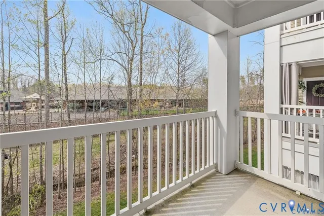 a view of a large building from a balcony