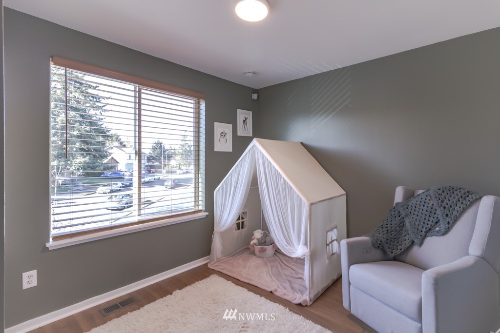 2829 Northeast 4th Court Renton, WA 98056 - Photo 11 of 26 a living room with furniture and a window