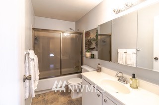 2829 Northeast 4th Court Renton, WA 98056 - Photo 14 of 26 a bathroom with a sink and a mirror