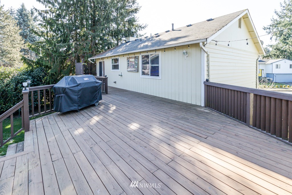 2829 Northeast 4th Court Renton, WA 98056 - Photo 23 of 26 a view of a house with a roof deck